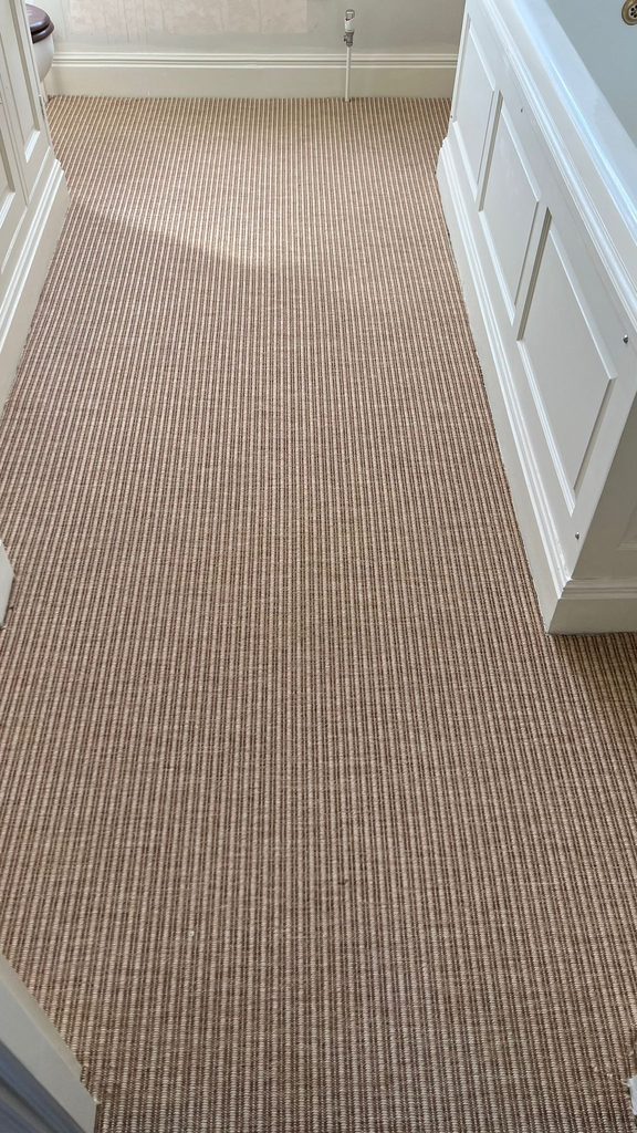 Close-up detail of sisal carpet weave and texture