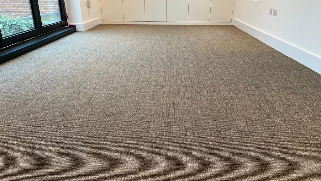 Close-up detail of sisal carpet weave and texture