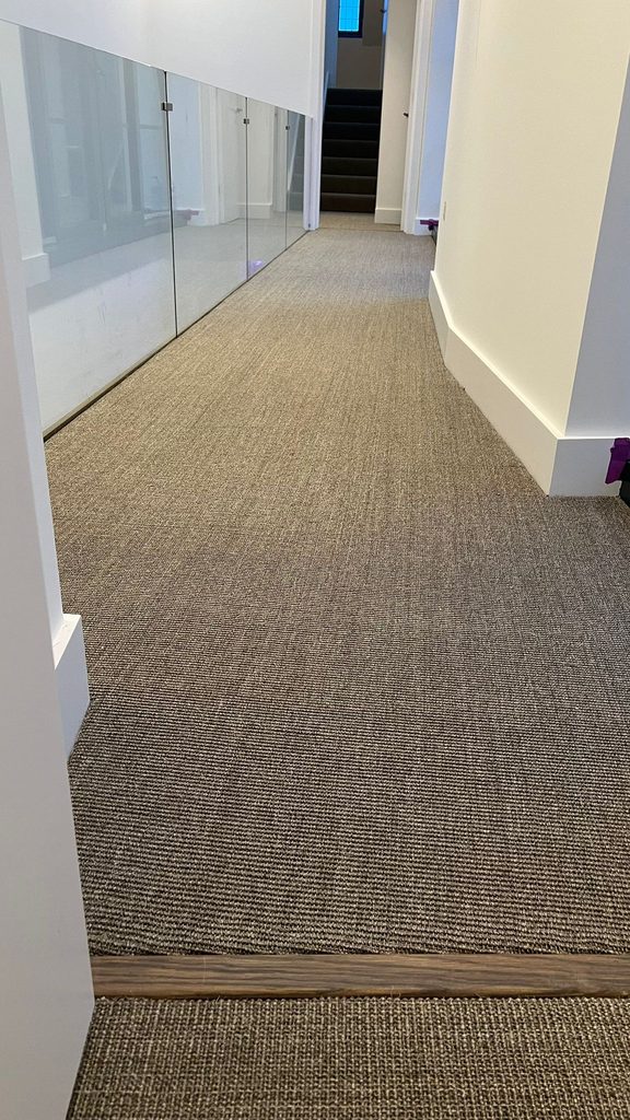 Close-up detail of sisal carpet weave and texture