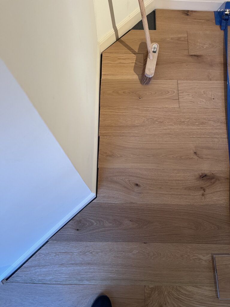 Engineered wood flooring installation in progress, South West London
