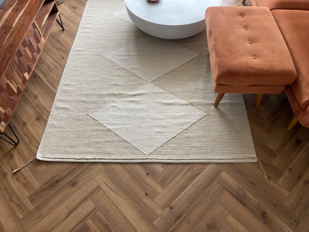 Completed herringbone engineered wood flooring installation, South West London