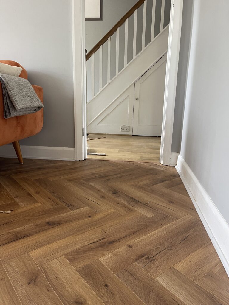 Completed herringbone engineered wood flooring installation, South West London